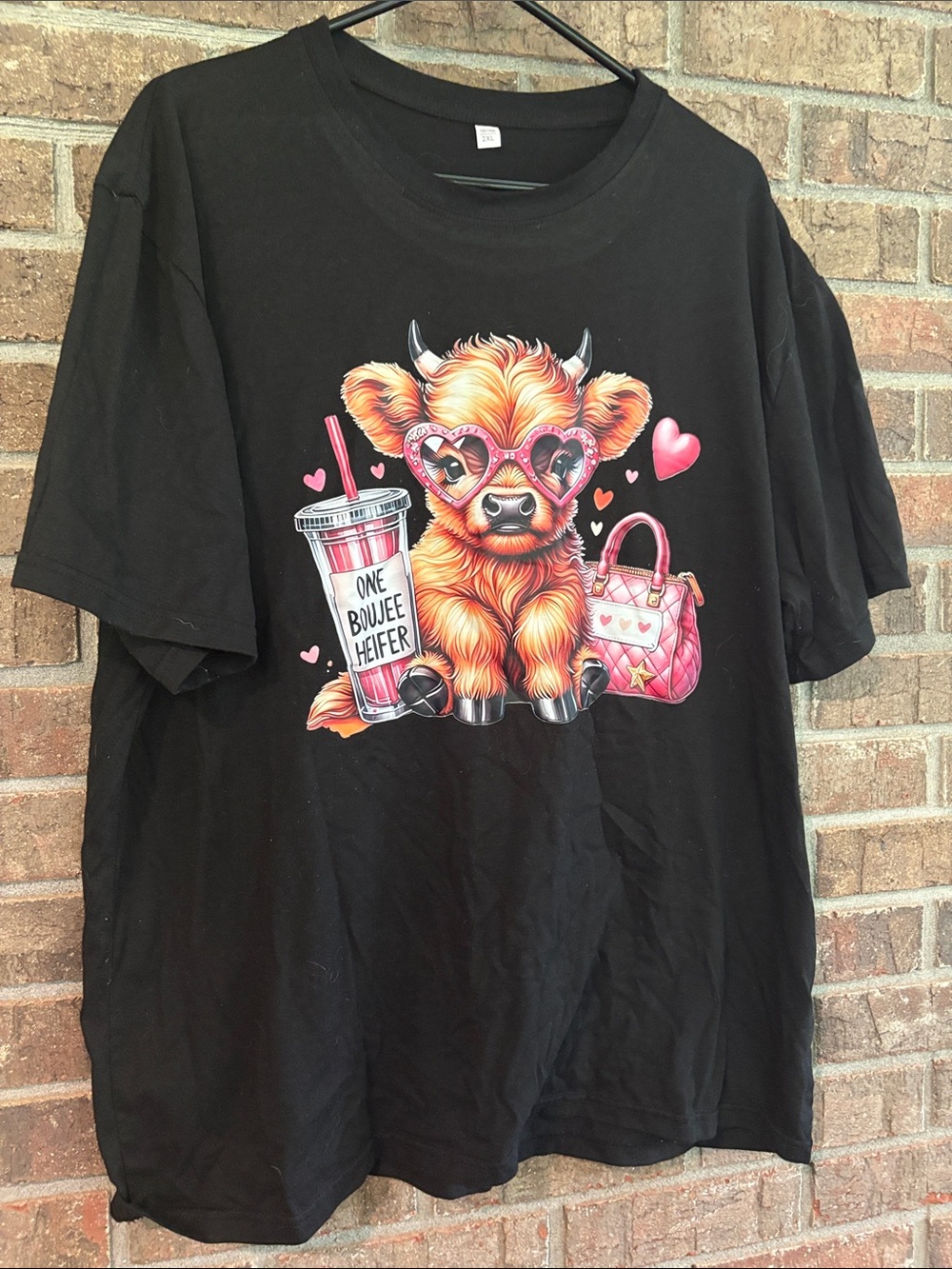 Black Graphic Tee with Pink-Accented Cow Illustration